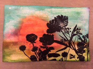 Paint over the background with water for a different effect & then Stamp on Paper Garden onto the background