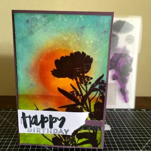 Paper Garden – September 2015 Stamp of the Month. Sponged background spritzed with water